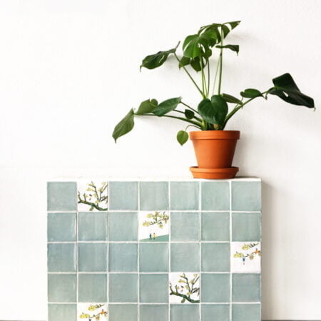 ocean green blanco tegels met plant